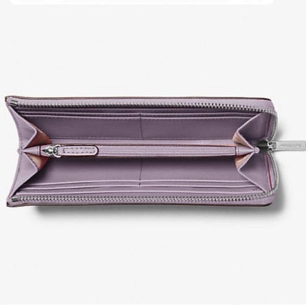 MICHAEL KORS Jet Set Travel Lg Saffiano Leather Quarter-Zip Wallet
Lt Quartz
NWT - Picture 3 of 16